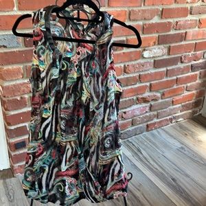 Black sleeveless top.